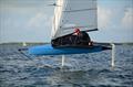 Andrew Scrivan puts his Moth through the paces during a 2019 Foiling Midwinters event