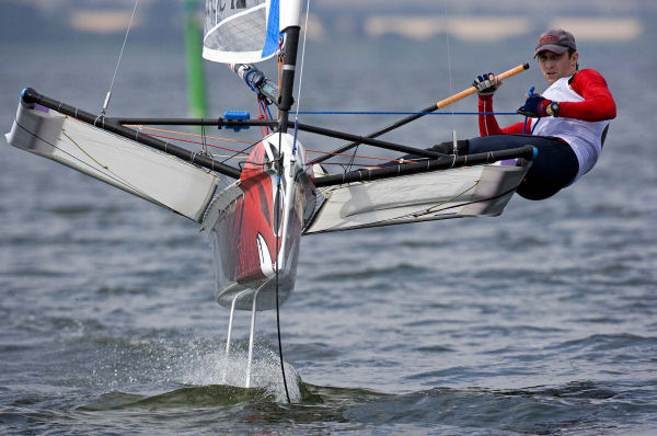 Rohan Veal on day one of the International Moth worlds at Horsens, Denmark photo copyright Th.Martinez / www.thmartinez.com taken at  and featuring the International Moth class