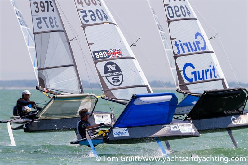 Racing on the final day of International Moth World Championships photo copyright Tom Gruitt / YachtsandYachting.com taken at Hayling Island Sailing Club and featuring the International Moth class