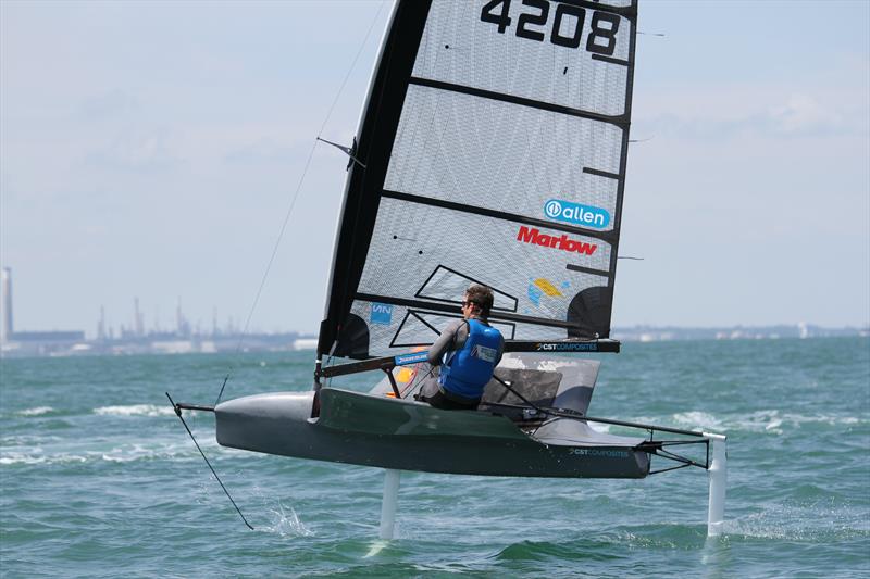 Dylan Fletcher wins race 1 on day 1 of the 2015 International Moth UK Nationals photo copyright Mark Jardine taken at Stokes Bay Sailing Club and featuring the International Moth class