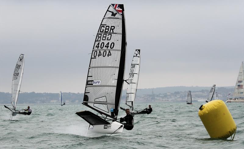 Dan Henderson on day 2 of the International Moth UK Nationals at Stokes Bay photo copyright Mark Jardine taken at Stokes Bay Sailing Club and featuring the International Moth class