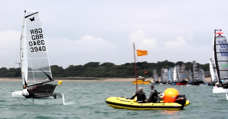 Penny Clark port-tacks the fleet on day 2 of the International Moth UK Nationals at Stokes Bay - photo © Mark Jardine