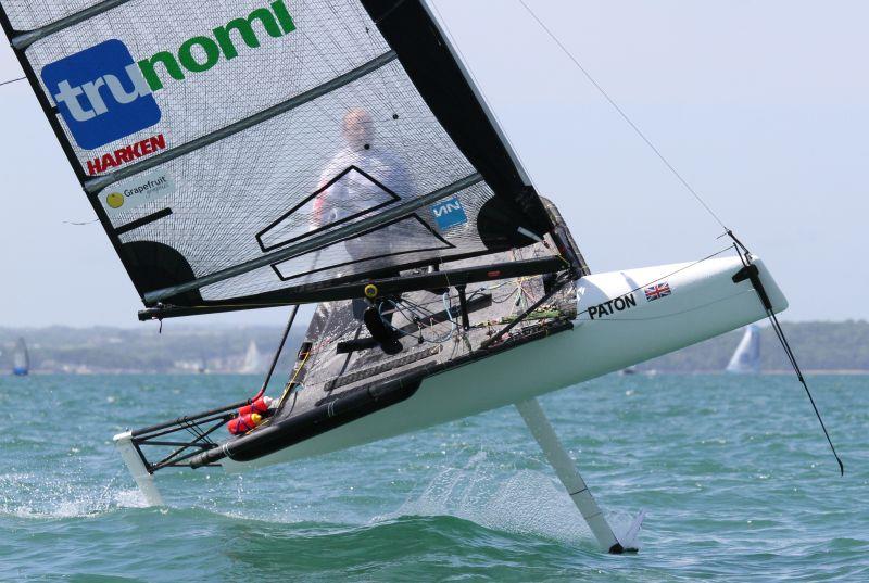 Ben Paton wheelie on day 3 of the International Moth UK Nationals at Stokes Bay photo copyright Mark Jardine taken at Stokes Bay Sailing Club and featuring the International Moth class