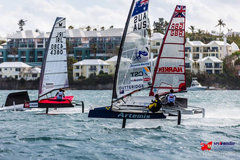 Annalise Murphy (IRL 4380) and Nathan Outteridge (AUS 1) sprint down Hamilton Harbour during the MS Amlin 'Dash for Cash' photo copyright Beau Outteridge / MS Amlin International Moth Regatta taken at Royal Bermuda Yacht Club and featuring the International Moth class