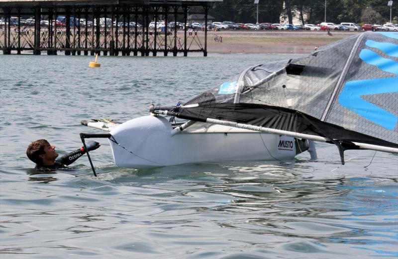 Richard Mason's mast falls early on day 3 of the UK International Moth Nationals at Paignton photo copyright Mark Jardine / IMCA UK taken at Paignton Sailing Club and featuring the International Moth class