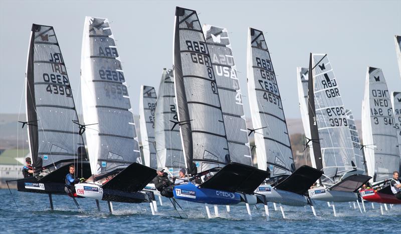 Close racing on the final day of the 2019 Wetsuit Outlet UK Moth Nationals at Castle Cove SC photo copyright Mark Jardine / IMCA UK taken at Castle Cove Sailing Club and featuring the International Moth class