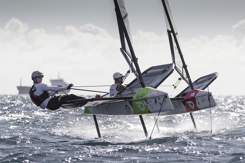 Close racing among the Moth-like one design Onefly class photo copyright Jean-Marie Liot / Martinique Flying Regatta taken at  and featuring the International Moth class