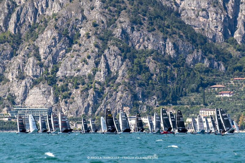 76 boats makes for a big start line. Malcesine Pre-Worlds 2021 photo copyright Angela Trawoeger taken at Fraglia Vela Malcesine and featuring the International Moth class