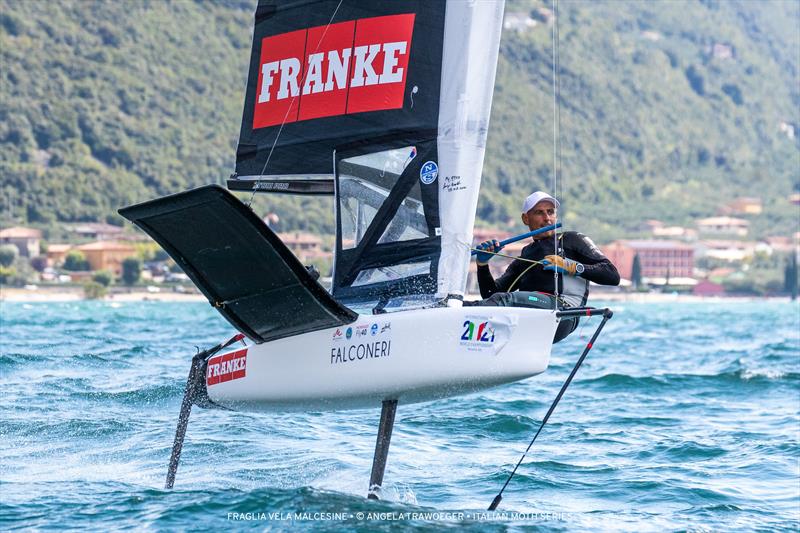 Redoro Fantai Venetia Moth Worlds 2021. Francesco Bruni, Senior Sailor photo copyright Angela Trawoeger taken at Fraglia Vela Malcesine and featuring the International Moth class