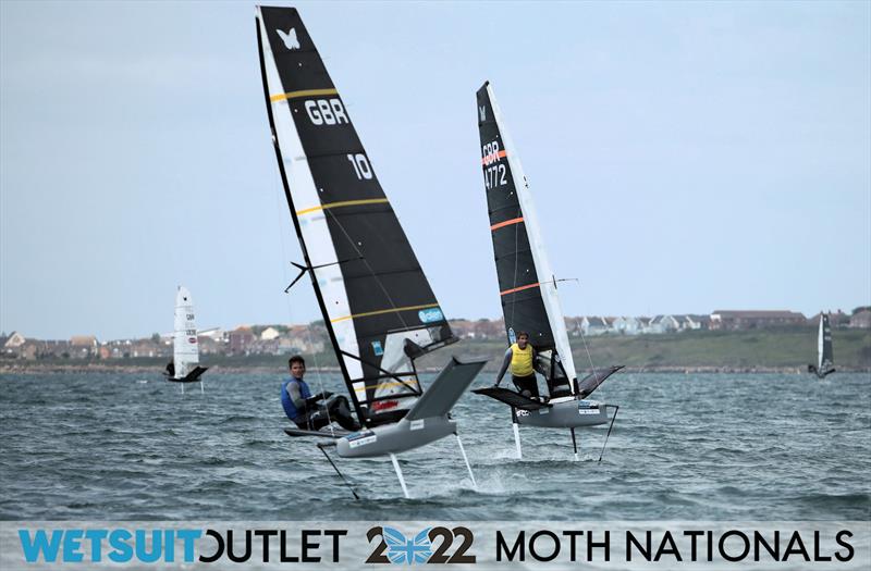 Dylan Fletcher and Simon Hiscocks approach the leeward gate during Race 13 on Day 4 of the 2022 Wetsuit Outlet UK Moth Class Nationals at the WPNSA photo copyright Mark Jardine / IMCA UK taken at Weymouth & Portland Sailing Academy and featuring the International Moth class