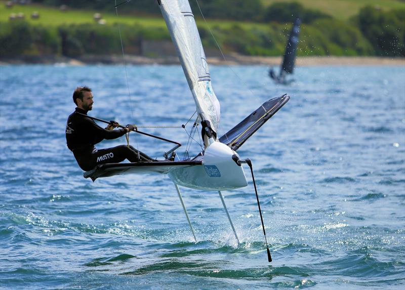 Daniel Holman on Day 2 of the Wetsuit Outlet International Moth UK Nationals photo copyright Mark Jardine / IMCAUK taken at Restronguet Sailing Club and featuring the International Moth class