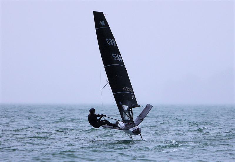 GBR 5168 Hattie Rogers rounds the Race 9 leeward gate on Wetsuit Outlet International Moth UK Championship Day 4 photo copyright Mark Jardine taken at Royal Torbay Yacht Club and featuring the International Moth class