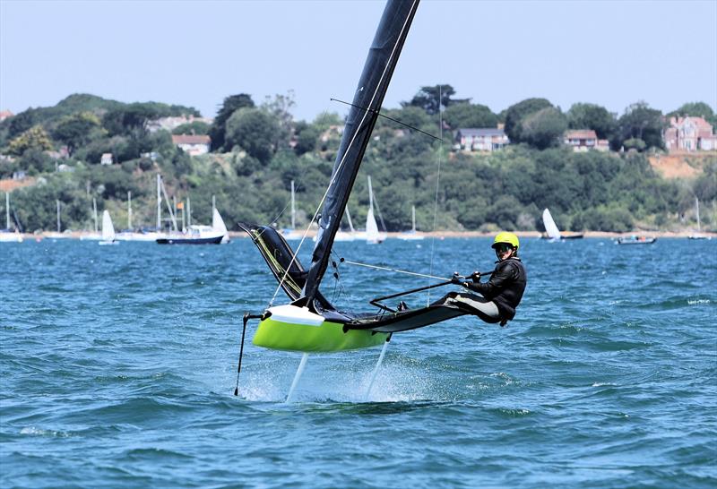Wetsuit Outlet International Moth UK Nationals at the WPNSA Day 4 - GBR 4522 Josie Gliddon finishes Race 10 photo copyright Mark Jardine taken at Weymouth & Portland National Sailing Academy and featuring the International Moth class