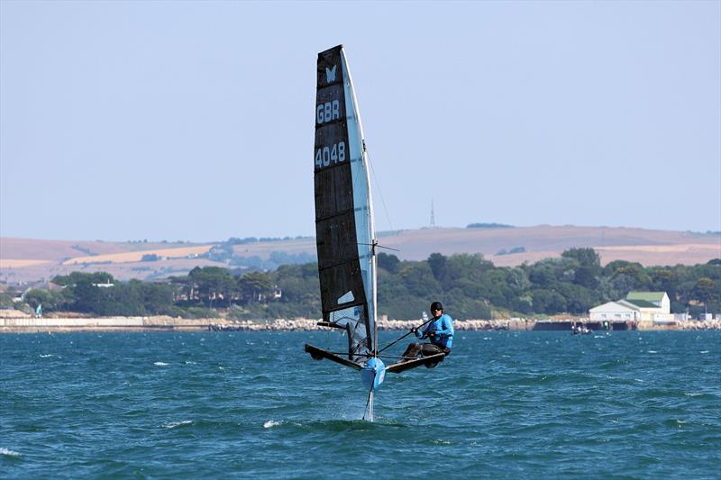 Wetsuit Outlet International Moth UK Nationals at the WPNSA Day 4 - GBR 4048 during Race 9 photo copyright Mark Jardine taken at Weymouth & Portland National Sailing Academy and featuring the International Moth class