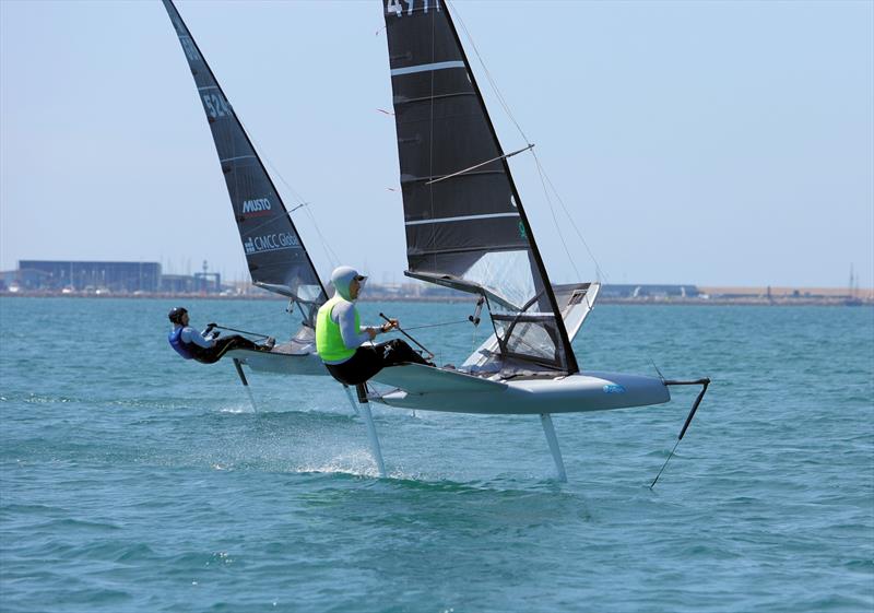 Wetsuit Outlet International Moth UK Nationals at the WPNSA Day 4 - GBR 5250 Kyle Stoneham and GBR 4999 Henry Wetherell at the Race 11 windward gate - photo © Mark Jardine