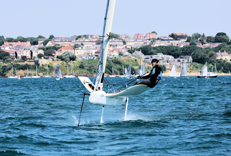 Wetsuit Outlet International Moth UK Nationals at the WPNSA Day 4 - GBR 4852 Chris White finishes Race 9 photo copyright Mark Jardine taken at Weymouth & Portland National Sailing Academy and featuring the International Moth class