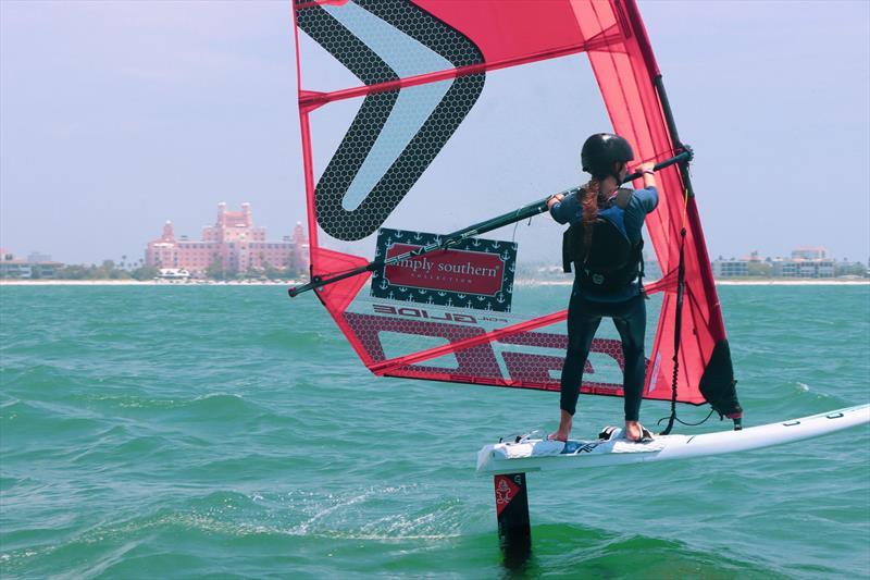 Gianna Talrico gets her iQFoil out of the water in light racecourse airs photo copyright Britt Viehman taken at New York Yacht Club and featuring the iQFoil class