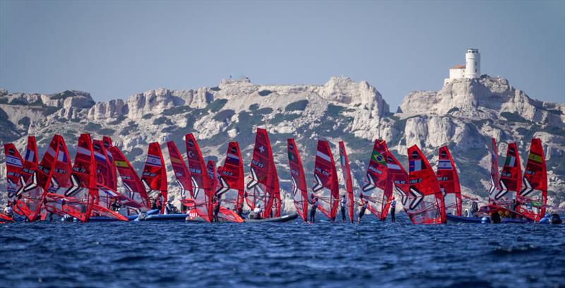 Start line with dramatic back drop - iQFOiL European Championships 2022 photo copyright Pierick Jeannoutot taken at Circolo Vela Torbole and featuring the iQFoil class