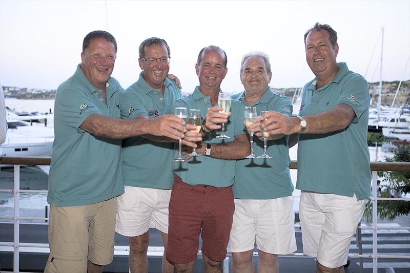 The crew of Carmola who were second in the slow handicap at the Vendee Menorca Week 2014 photo copyright Silvina Varela taken at Club Maritimo de Mahon and featuring the IRC class
