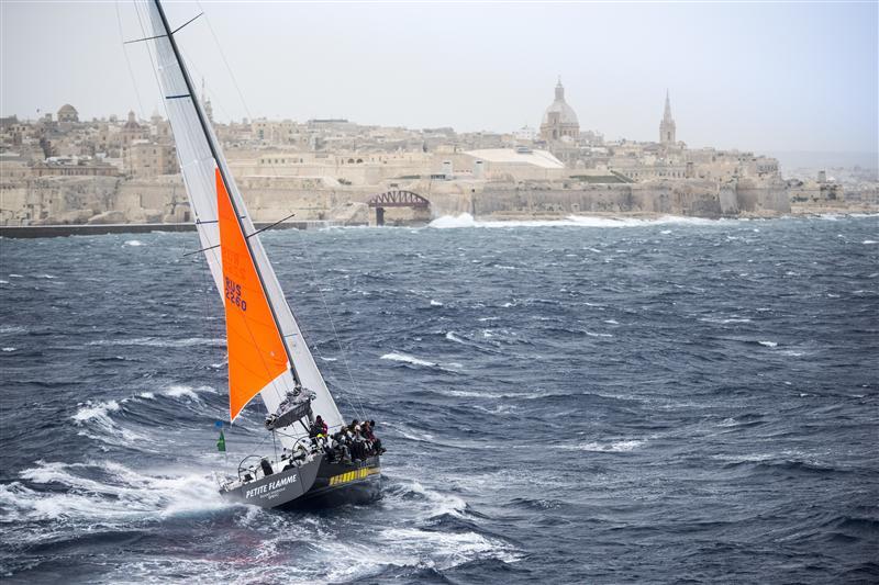 Dmitry Samohkhin's PETITE FLAMME entering Marsamxett Harbour to cross the finish line of the Rolex Middle Sea Race photo copyright Kurt Arrigo / Rolex taken at Royal Malta Yacht Club and featuring the IRC class