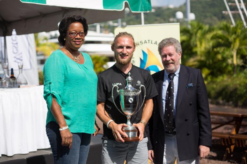 Fred Pilkington holds the exquisite sterling silver trophy presented by the IMA for Line Honours photo copyright Arthur Daniel & Orlando K Romain / RORC taken at  and featuring the IRC class