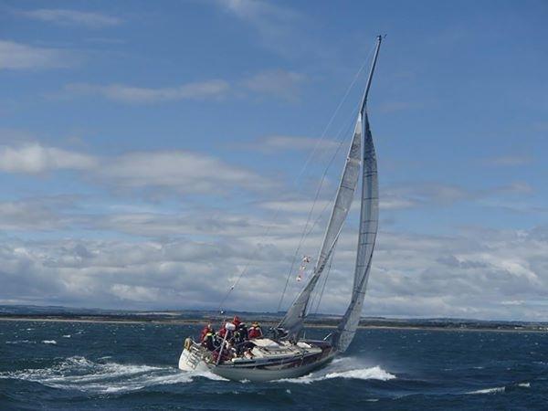 Medmerry II powers to victory in the inaugural Northumberland Plate Race photo copyright Trevor Walker taken at Royal Northumberland Yacht Club and featuring the IRC class