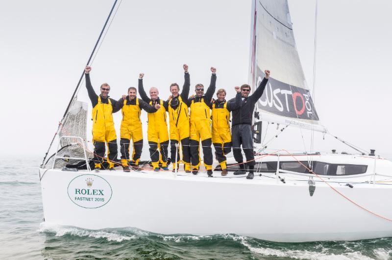 A winning crew: Géry Trentesaux's French JPK 10.80, Courrier Du Leon wins the 46th Rolex Fastnet Race, crew: Aubry Arnaud, Antoine Carpentier, Géry Trentesaux, Jean Louis Couedel, Francois Lamiot, Pierre Ghewy, Jean Pierre Nicol photo copyright Rolex / Daniel Forster taken at  and featuring the IRC class