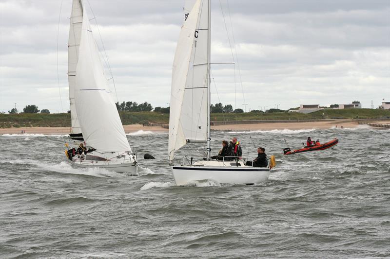 Starlight on port avoids Jondalar during the Royal Northumberland Yacht Club Regatta photo copyright Alan Smith taken at Royal Northumberland Yacht Club and featuring the IRC class