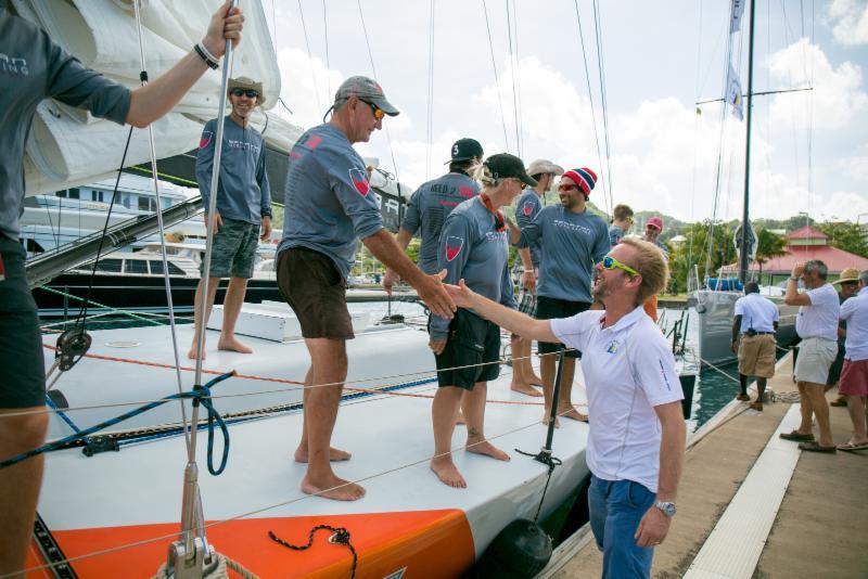Dockside greeting as the RORC Race Team, marina staff and other competitors welcome Challenger to Grenada - photo © RORC / Arthur Daniel