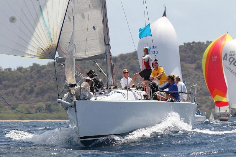 Pocket Rocket competing in the 2014 Antigua Sailing Week photo copyright Tim Wright / www.photoaction.com taken at Antigua Yacht Club and featuring the IRC class