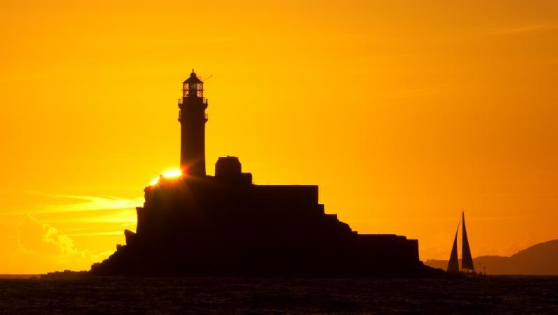 Rounding the historic Fastnet Rock - a lasting memory for all crews in the Rolex Fastnet Race starting from the Royal Yacht Squadron on Sunday 6th August - photo © Rolex / Daniel Forster