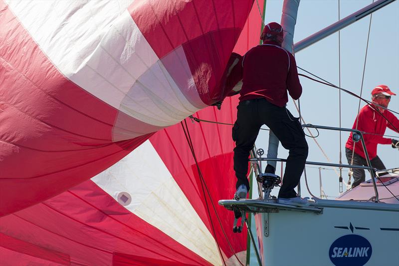 On the bow of Mach 1 at SeaLink Magnetic Island Race Week photo copyright Andrea Francolini taken at Townsville Yacht Club and featuring the IRC class