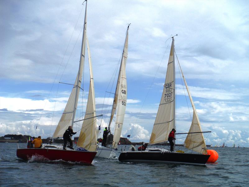 Less Xpense, Glory Days, Super Q at the windward mark on Saturday during the UBS Jersey Regatta 2017 photo copyright Bill Harris taken at Royal Channel Islands Yacht Club and featuring the IRC class