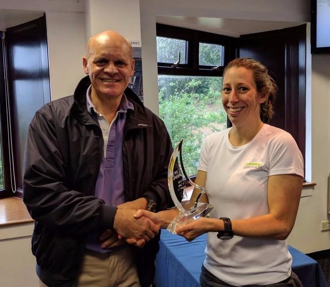 Phil Hagen presents Nifty's Emily Bowden-Eyre with the IRC One Trophy for the IRC Spinlock Autumn Championship photo copyright Hamble Winter Series taken at Hamble River Sailing Club and featuring the IRC class