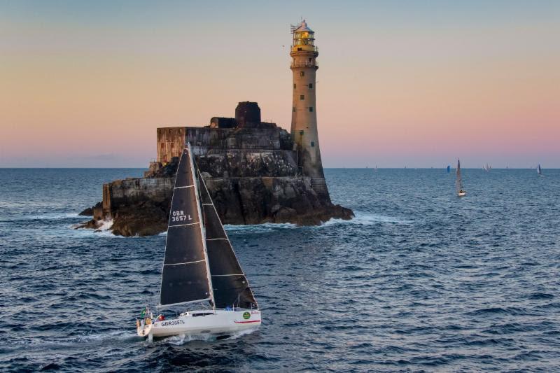 Rob Craigie and Deb Fish win the IRC Two Handed Class and the Boyd Trophy for Mixed Two Handed Division in  their Sun Fast 3600 Bellino, seen here rounding the Fastnet Rock photo copyright Rolex / Carlo Borlenghi taken at Royal Ocean Racing Club and featuring the IRC class