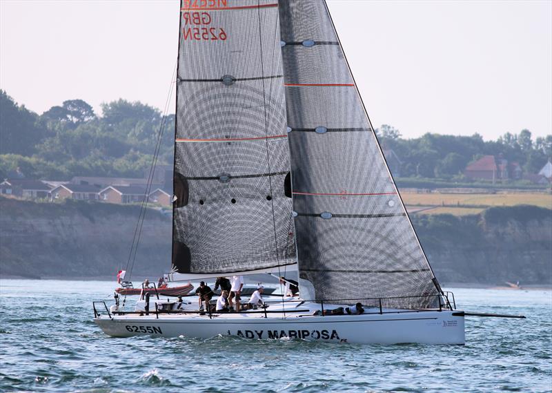 The leaders pass Hurst Castle and approach the Needles during the 2018 Round the Island Race - photo © Mark Jardine / YachtsandYachting.com