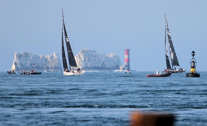 The leaders pass Hurst Castle and approach the Needles during the 2018 Round the Island Race - photo © Mark Jardine / YachtsandYachting.com