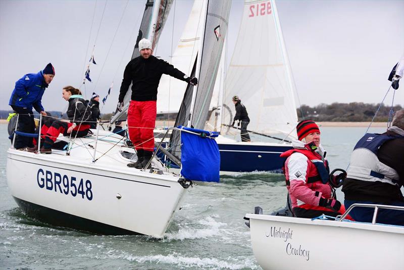 Midnight Cowboy leads over the line on day 1 of the HRSC Wednesday Night Early Bird Series photo copyright Trevor Pountain taken at Hamble River Sailing Club and featuring the IRC class