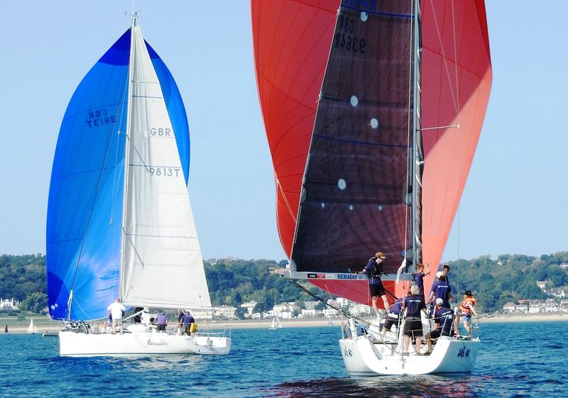 Abracadabra leads Jai Ho during the Carey Olsen Jersey Regatta photo copyright Nick Poole taken at Royal Channel Islands Yacht Club and featuring the IRC class