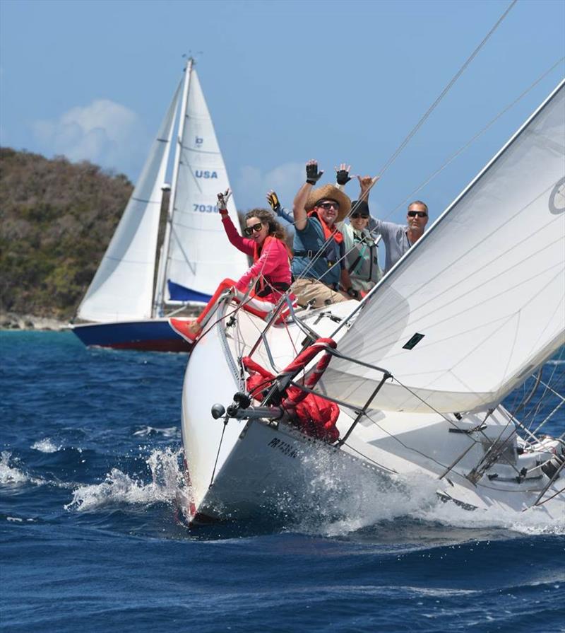 2021 St. Thomas International Regatta Round the Rocks Race: The Chili Pepper crew is happy to be out racing in beautiful conditions photo copyright Dean Barnes taken at St. Thomas Yacht Club and featuring the IRC class