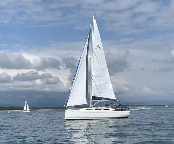 Rob and Sarah Smith face light airs and challenging conditions on their Hanse during the Tremadog Bay Pop-Up Regatta photo copyright Avril Banks taken at Pwllheli Sailing Club and featuring the IRC class