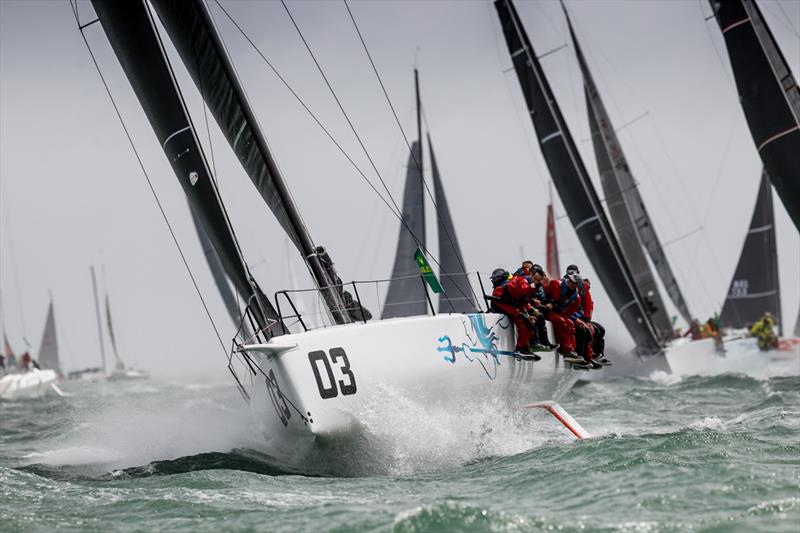 In IRC One, RORC Commodore James Neville's HH42 INO XXX was vying for the lead on the water in the Rolex Fastnet Race photo copyright Paul Wyeth / www.pwpictures.com taken at Royal Ocean Racing Club and featuring the IRC class