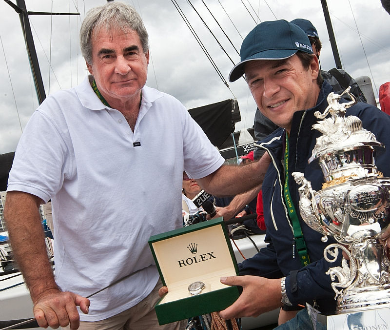 Patrick Boutellier, Rolex Australia, presents a Rolex Yachtmaster and Tattersall Cup to Geoff Boettcher, owner of Secret Men’s Business 3.5 winner of the Rolex Sydney Hobart Yacht Race overall photo copyright Carlo Borlenghi / Rolex taken at  and featuring the IRC class