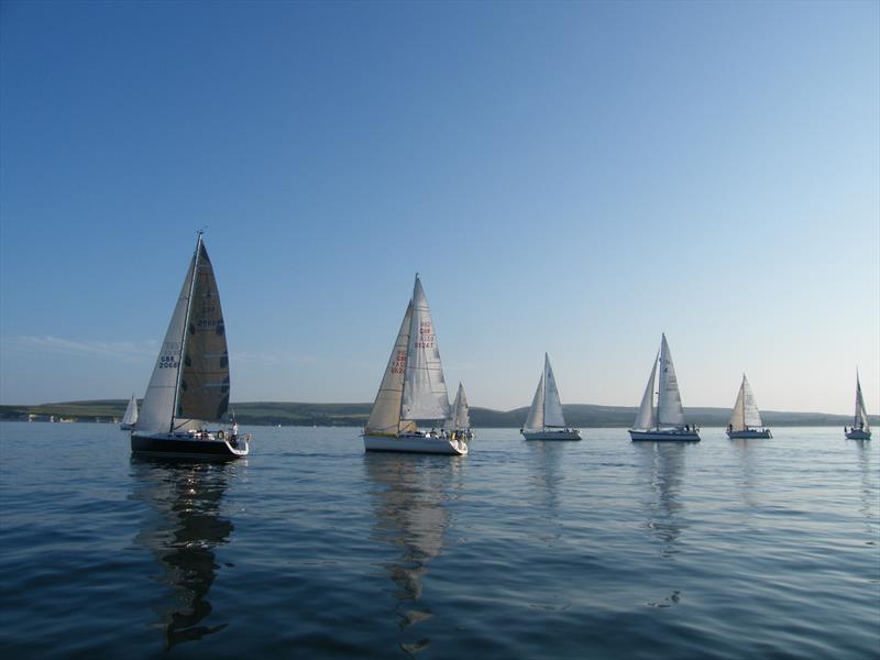 The Poole-Weymouth race sponsored by Magnum photo copyright Mike Fox taken at Poole Yacht Racing Association and featuring the IRC class