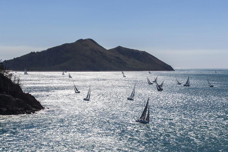 Some of the fleet at Hamilton Island Race Week 2017 sail towards the finish line in the late afternoon photo copyright Andrea Francolini taken at Hamilton Island Yacht Club and featuring the IRC class