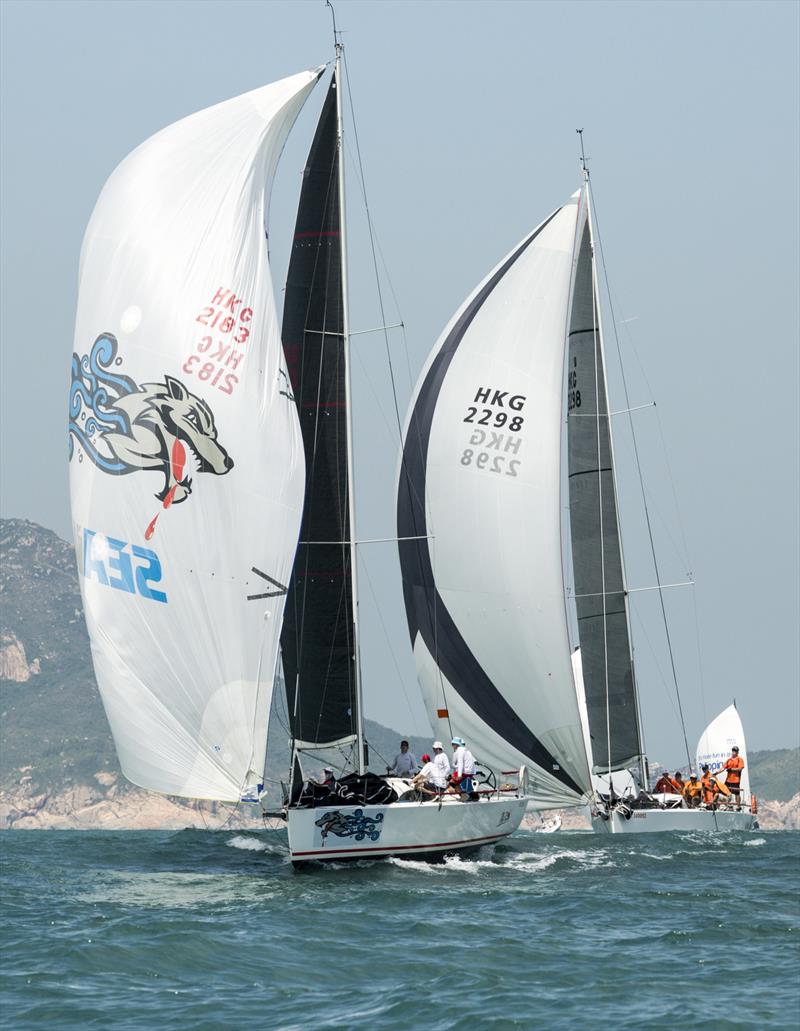 Red Rum (left) have a good first day in the Volvo China Coast Regatta photo copyright RHKYC / Guy Nowell taken at Royal Hong Kong Yacht Club and featuring the IRC class