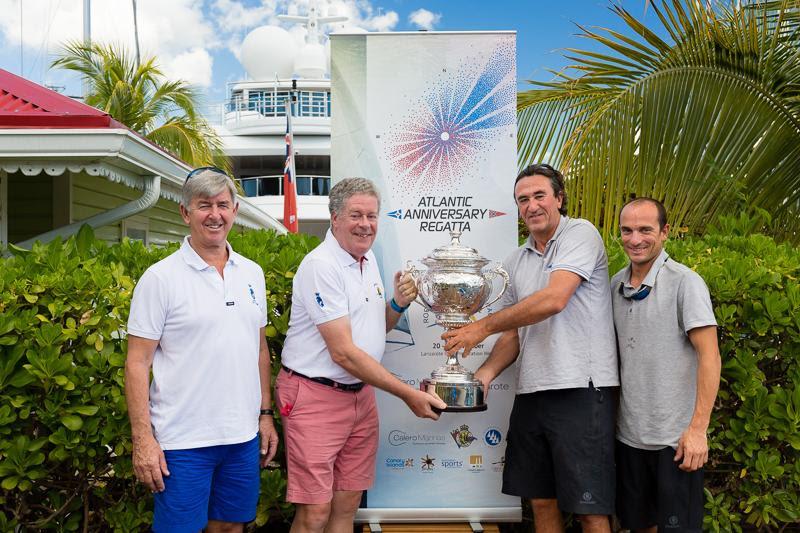 From L to R: RORC Chief Executive Eddie Warden Owen and RORC Admiral Andrew McIrvine with Teasing Machine's Tony Brochet and Betrand Castelnerac - photo © RORC / Arthur Daniel