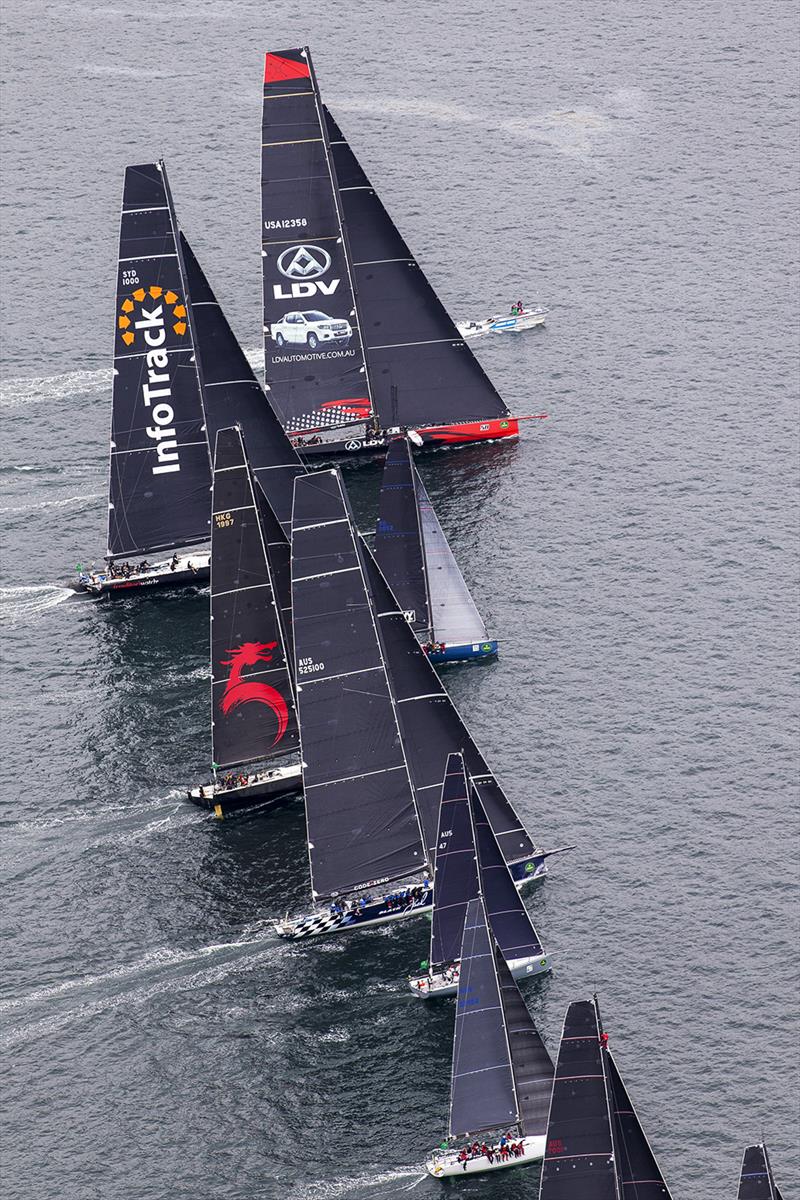 LDV Comanche, InfoTrack, Beau Geste and Black Jack tower over their 'smaller' colleagues at the front startline photo copyright Andrea Francolini taken at Cruising Yacht Club of Australia and featuring the IRC class