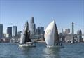 Eclipse and Squirrel race along the San Francisco waterfront in the Red Bra Regatta sponsored by Taiwan © Kara Hugglestone / Sail Couture