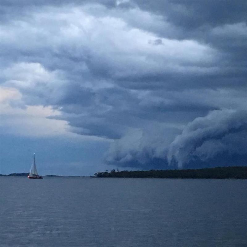 Storm clouds over D'Entrecasteaux Channel as the fleet sails north photo copyright Colleen Darcey taken at Royal Yacht Club of Tasmania and featuring the IRC class